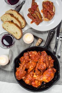 Capon braised in tomato sauce