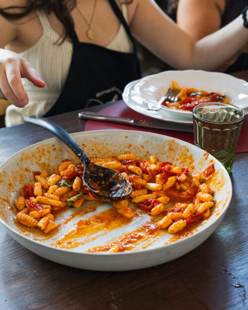 Homemade cavatelli with burst cherry tomato sauce served during a cooking class in Tuscany
