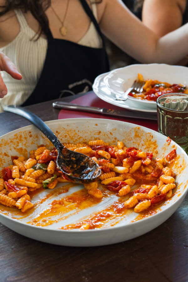 Homemade cavatelli with burst cherry tomato sauce served during a cooking class in Tuscany